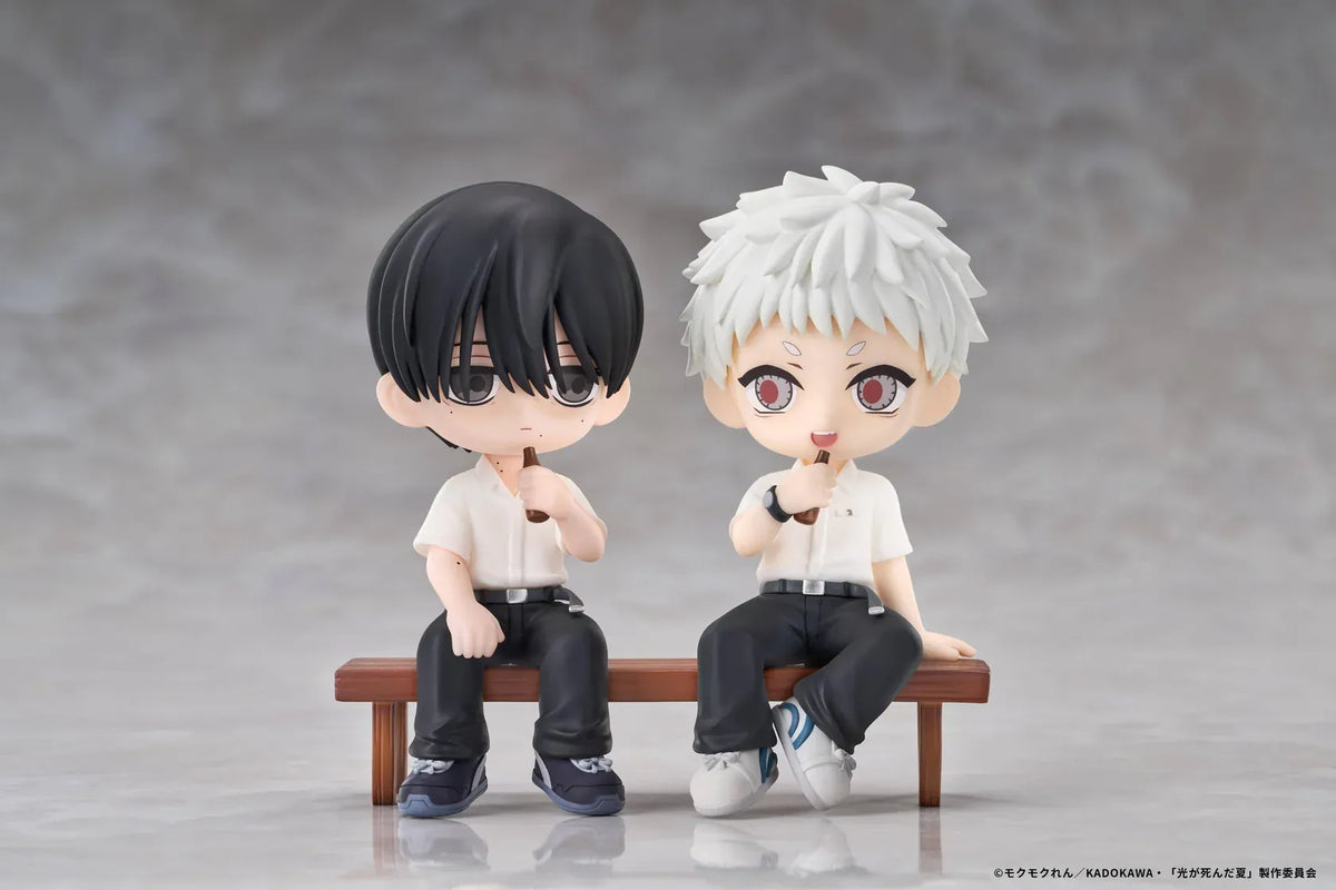 The Summer Hikaru Died Yoshiki & Hikaru Chibi Figure featuring black-haired Yoshiki and white-haired Hikaru sitting together on a wooden bench while enjoying frozen treats in front of a Japanese ice cream shop with a red and white striped awning and transparent display base.