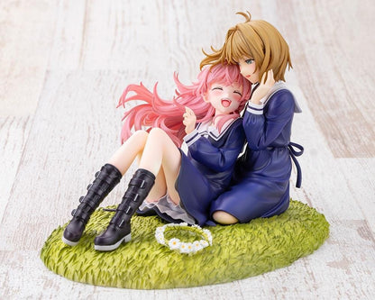 I Want to Love You Till Your Dying Day Sheena & Mimi 1/8 Scale Figure featuring pink-haired Sheena smiling with her eyes closed while leaning against blonde-haired Mimi. Both wear navy-blue school-inspired dresses and sit together on a textured grassy display base decorated with a white daisy flower crown.