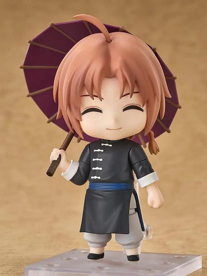 Gintama Nendoroid Kamui Figure with orange hair, black outfit, smiling expression, and umbrella accessory