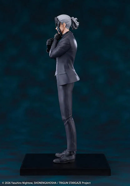 Trigun Stampede Oshi Works Livio the Double Fang Figure featuring Livio with silver hair, black suit, crossed-arm pose, stern expression, and display base.