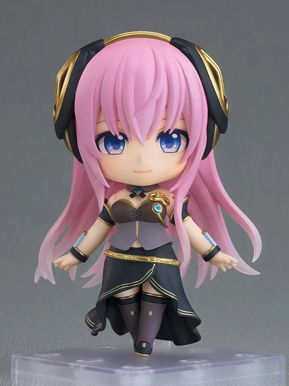 Hatsune Miku Nendoroid Megurine Luka V4X Figure with pink hair, headset, blue eyes, and black and gold Vocaloid outfit