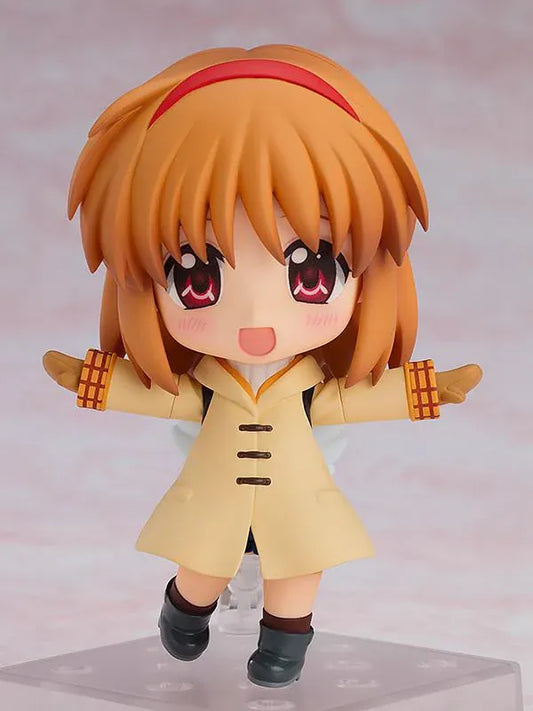 Kanon Nendoroid Ayu Tsukimiya figure featuring short brown hair, a red headband, cream duffle coat, mittens, black boots, and white wing details.