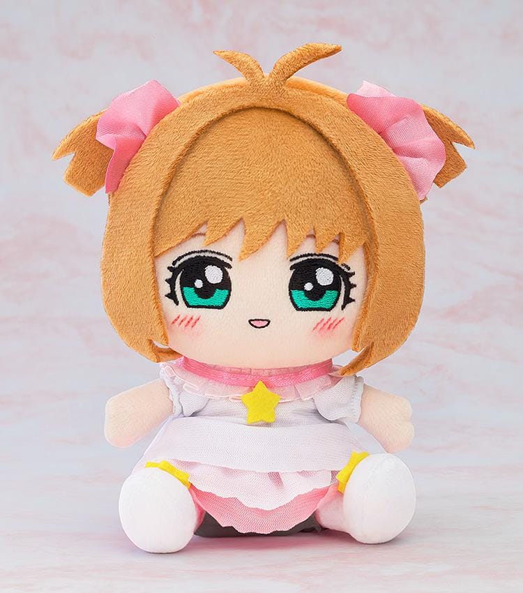 Cardcaptor Sakura Plushie Sakura Kinomoto Platinum Outfit Ver. featuring Sakura in a soft chibi-style seated plush design with teal eyes, pink bows, white outfit, and star accent.