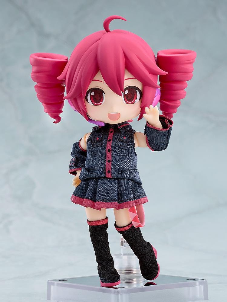 Kasane Teto Nendoroid Doll with pink drill-shaped twin tails, a headset microphone, and a dark fabric outfit with pink trim, posed waving.