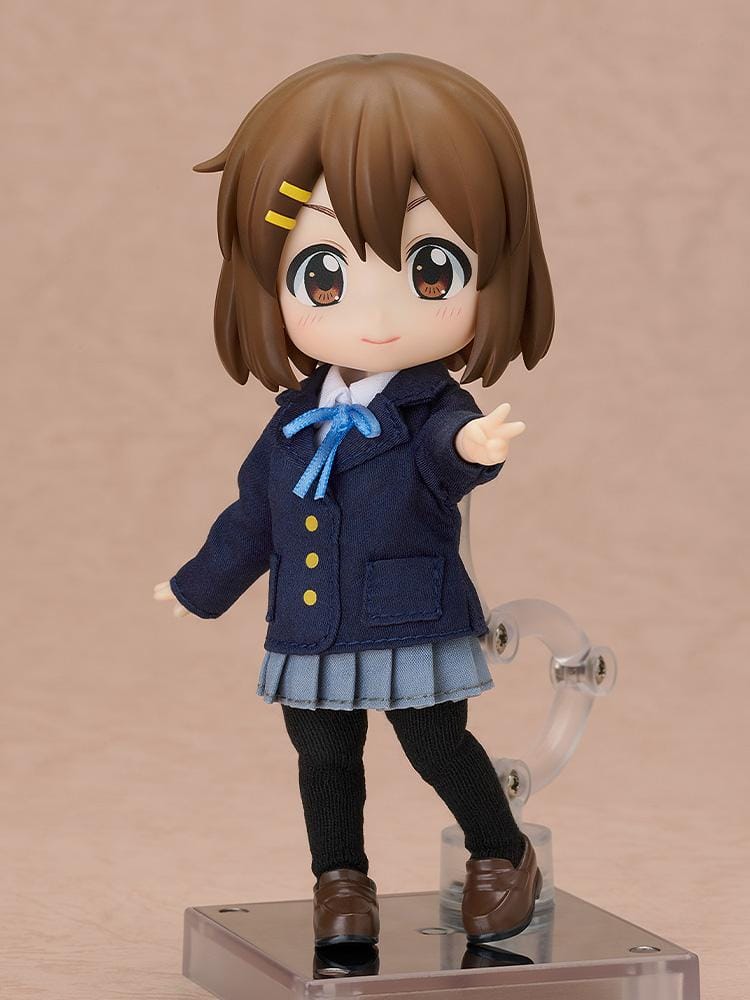 K-ON Nendoroid Doll Yui Hirasawa wearing her Sakuragaoka High School uniform with navy blazer, pleated skirt, and blue ribbon