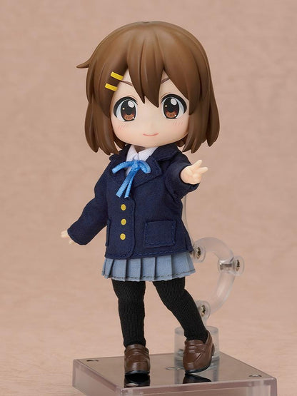 K-ON Nendoroid Doll Yui Hirasawa wearing her Sakuragaoka High School uniform with navy blazer, pleated skirt, and blue ribbon