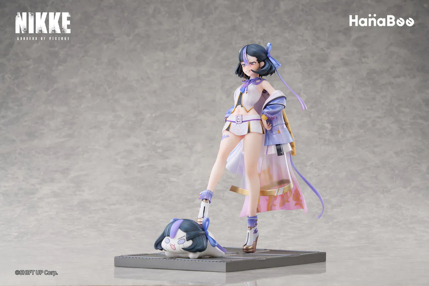 Goddess of Victory Nikke Syuen Deluxe Edition 1/6 Scale Figure featuring Syuen in a white-and-purple outfit with ribbon details, themed base, chibi mascot accent, can badge, and acrylic-style bonus artwork.