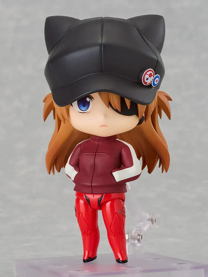 Rebuild of Evangelion Nendoroid Asuka Shikinami Langley Jersey Ver. Figure featuring Asuka in a chibi-style design with orange hair, black cat-ear cap, red jersey outfit, and eyepatch detail.