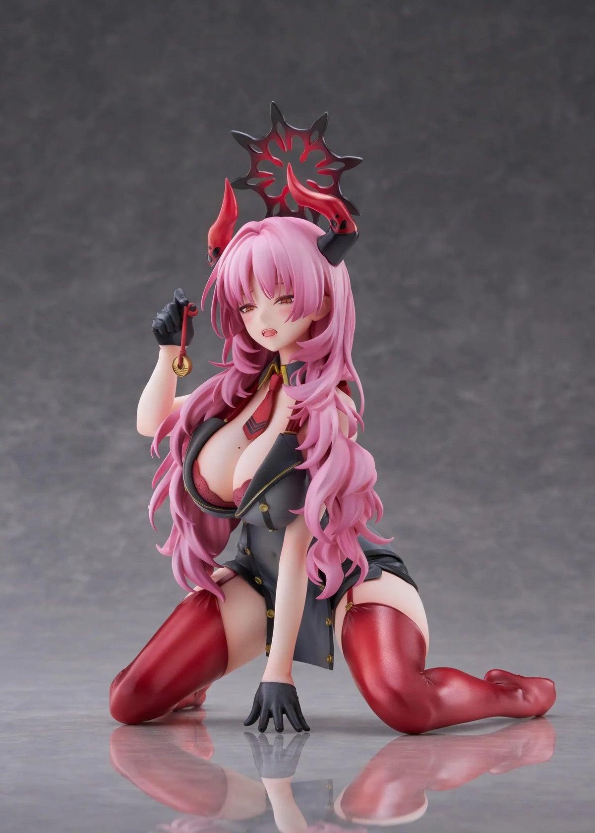 Blue Archive Satsuki Memorial Lobby 1/7 scale figure kneeling in a black-and-red outfit with flowing pink hair, horns, and a dark halo.