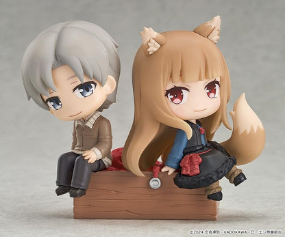 Spice and Wolf Mini Memory Lawrence and Holo chibi figure set sitting on a wooden crate base
