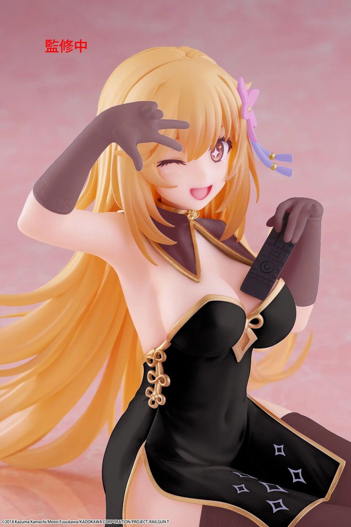 Desktop Cute Misaki Shokuho Chinese Dress Ver. figure seated in a black and gold dress, winking and holding a remote control, with flowing blonde hair