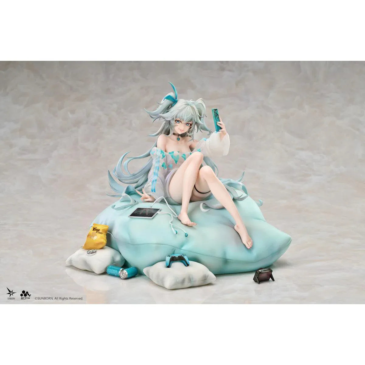 Girls' Frontline 2 Exilium Florence Marvellous Herb Cake Ver. 1/7 Scale Figure seated on a cushion with mint hair, phone accessory, pillows, snacks, and game controller details
