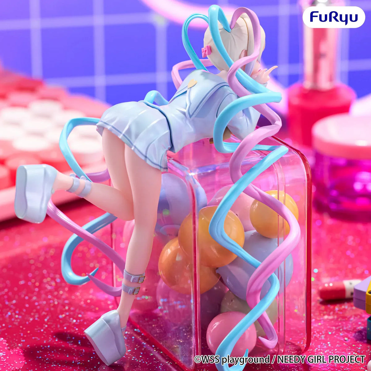 OMGKawaiiAngel Noodle Stopper figure featuring pink-and-blue twin tails, a sailor-inspired outfit, and a playful reclining pose.