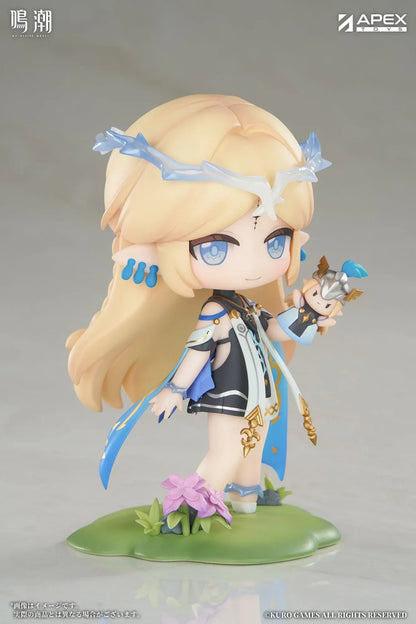 Chibi Cartethyia Jinseki Series figure with blonde hair, blue eyes, a pale blue headpiece, and a small armored companion, standing on a green floral base.