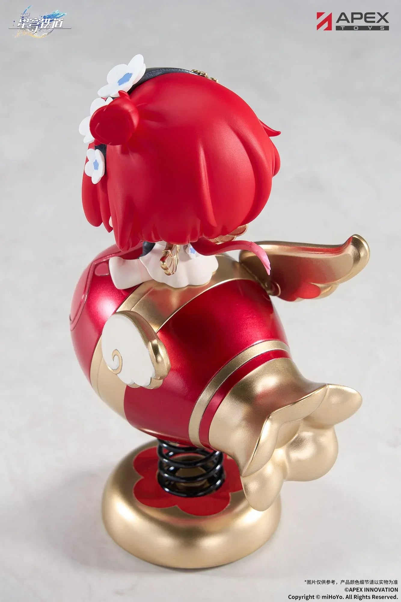 Honkai Star Rail Tribbie Chibi Chara Yurayura Stand Non-Scale Figure with red hair, flower details, red-and-gold spring base, and chibi design