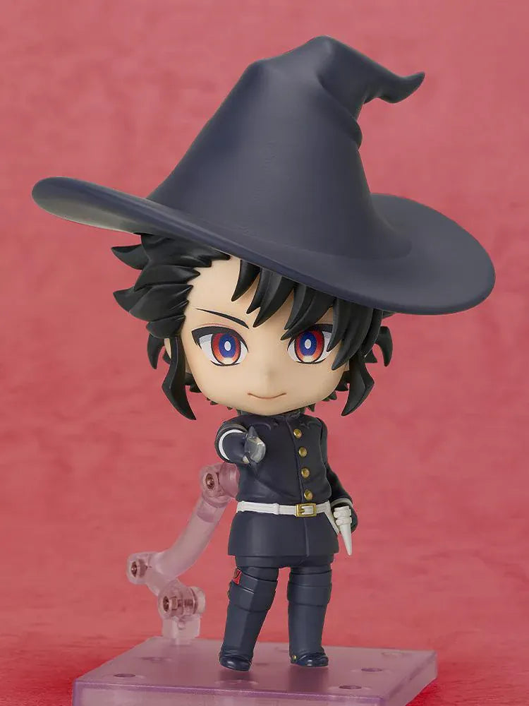 Ichi the Witch Nendoroid Ichi figure with black hair, red-and-blue eyes, an oversized dark witch hat, gold-colored buttons, and a white belt.
