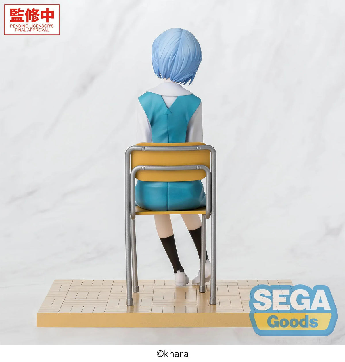 XStellar Rei Ayanami Uniform Ver. figure seated on a school chair with hands folded, wearing a blue and white uniform on a parquet-style floor base.