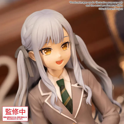 BanG Dream Ave Mujica Sakiko Togawa Uniform Ver. Premium Figure featuring Sakiko seated in a school uniform with long silver twin tails, golden eyes, beige blazer, and green plaid skirt.