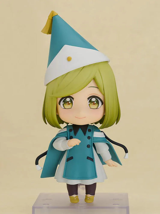 Nendoroid Coco figure from Witch Hat Atelier wearing witch hat and teal outfit in chibi style