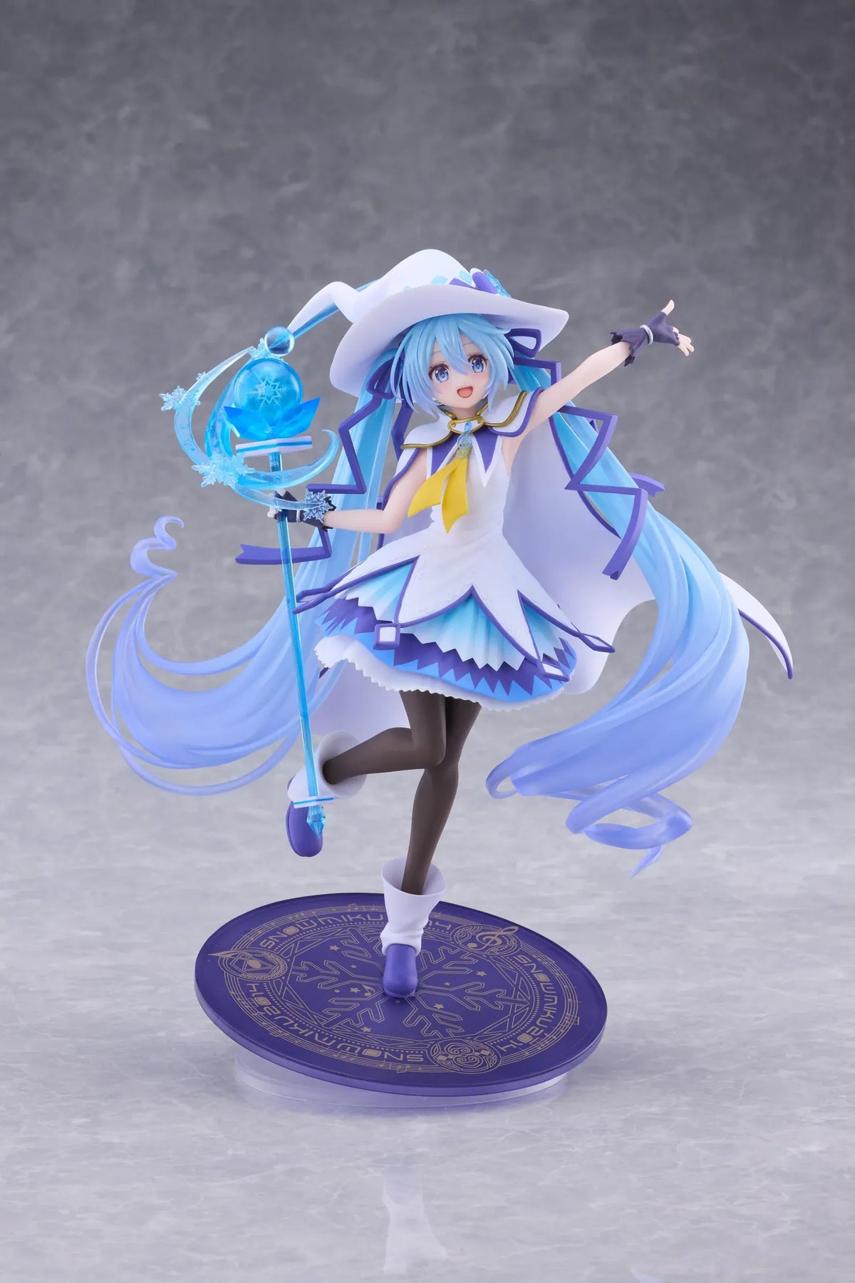 Snow Miku All Stars 2014 Ver. AMP+ figure wearing a white-and-blue snow sorceress outfit and holding a translucent magical staff.