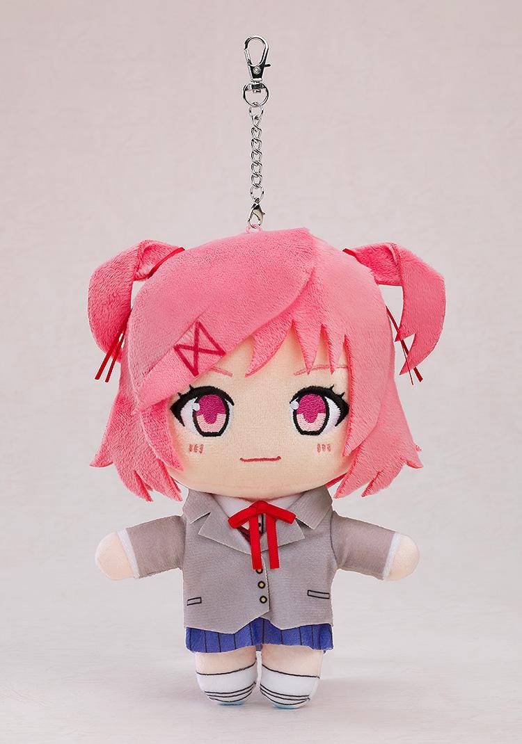 Doki Doki Literature Club! Natsuki plushie keychain with pink hair, embroidered pink eyes, red hair accessories, a school uniform, and a metal clasp.