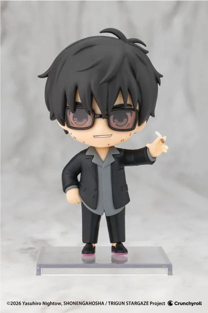 TRIGUN STARGAZE Oshi Works Mini Nicholas D. Wolfwood figure with black hair, tinted glasses, black suit, and raised hand holding a cigarette.