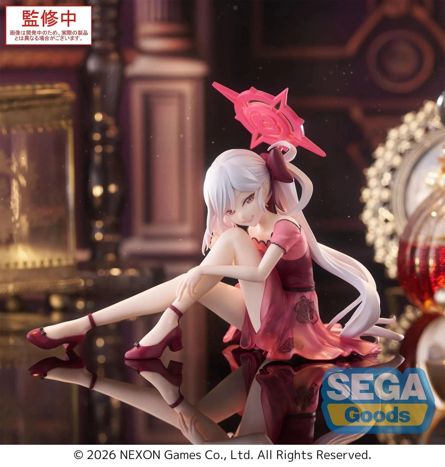 Blue Archive Yumemirize Mutsuki figure sitting in red dress with silver hair and playful expression