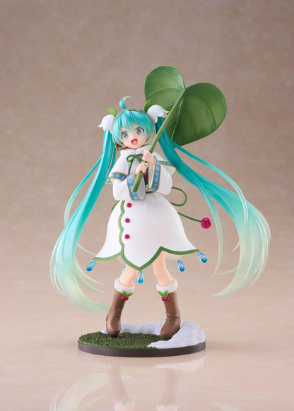 Snow Miku All Stars 2015 Ver. AMP+ figure wearing a white flower-inspired dress and holding an oversized green leaf.