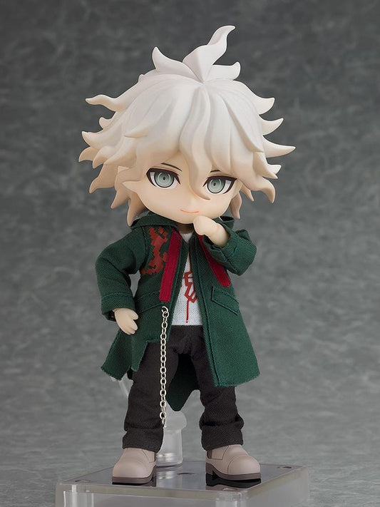 Danganronpa 2x2 Nendoroid Doll Nagito Komaeda with white hair, a dark green fabric coat, black trousers, gray shoes, and a silver-colored chain.