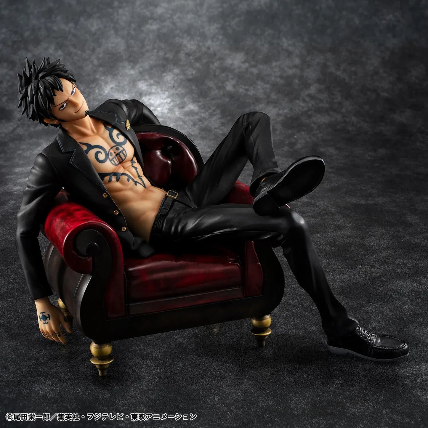 One Piece Portrait Of Pirates S.O.C. Trafalgar Law Ver. R Figure wearing a black suit and sitting in a red armchair