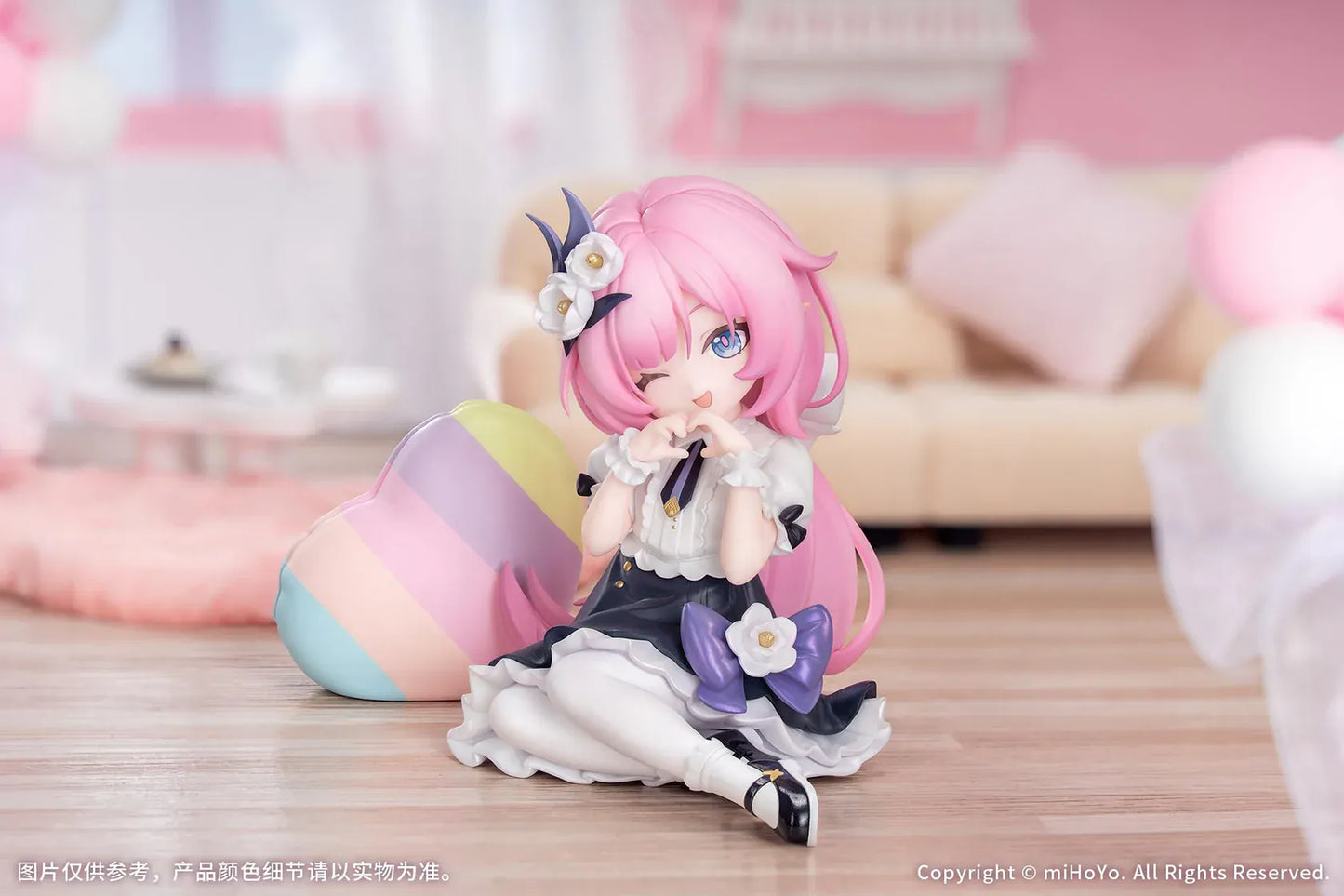 Honkai Impact 3rd Little Series Elysia Little Flame-Chaser Ver. Figure featuring Elysia with pink hair, chibi styling, black-and-white outfit, purple bow accents, and pastel heart cushion.