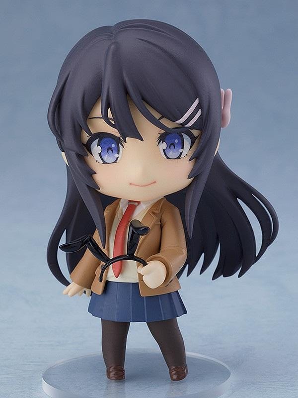 Rascal Does Not Dream of Bunny Girl Senpai Nendoroid Mai Sakurajima Figure (Rerelease) featuring a black-haired anime girl with blue eyes wearing a brown school blazer, red necktie, navy-blue pleated skirt, dark tights, and holding a black bunny ears accessory.