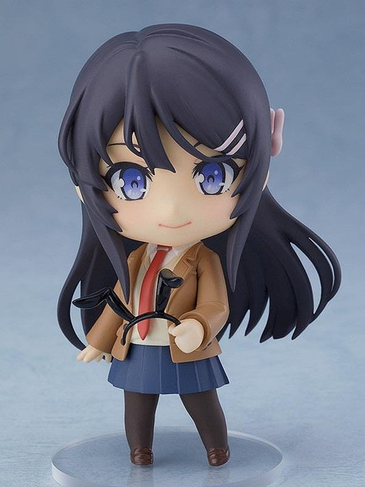 Rascal Does Not Dream of Bunny Girl Senpai Nendoroid Mai Sakurajima Figure (Rerelease) featuring a black-haired anime girl with blue eyes wearing a brown school blazer, red necktie, navy-blue pleated skirt, dark tights, and holding a black bunny ears accessory.