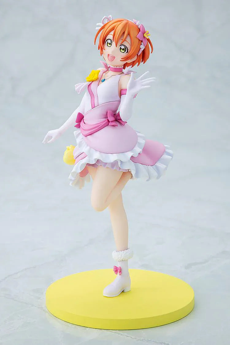 Love Live School Idol Project KD Colle Rin Hoshizora Bokutachi wa Hitotsu no Hikari Ver. Figure featuring Rin in a pink and white idol outfit with yellow flower accents, white gloves, and yellow display base.