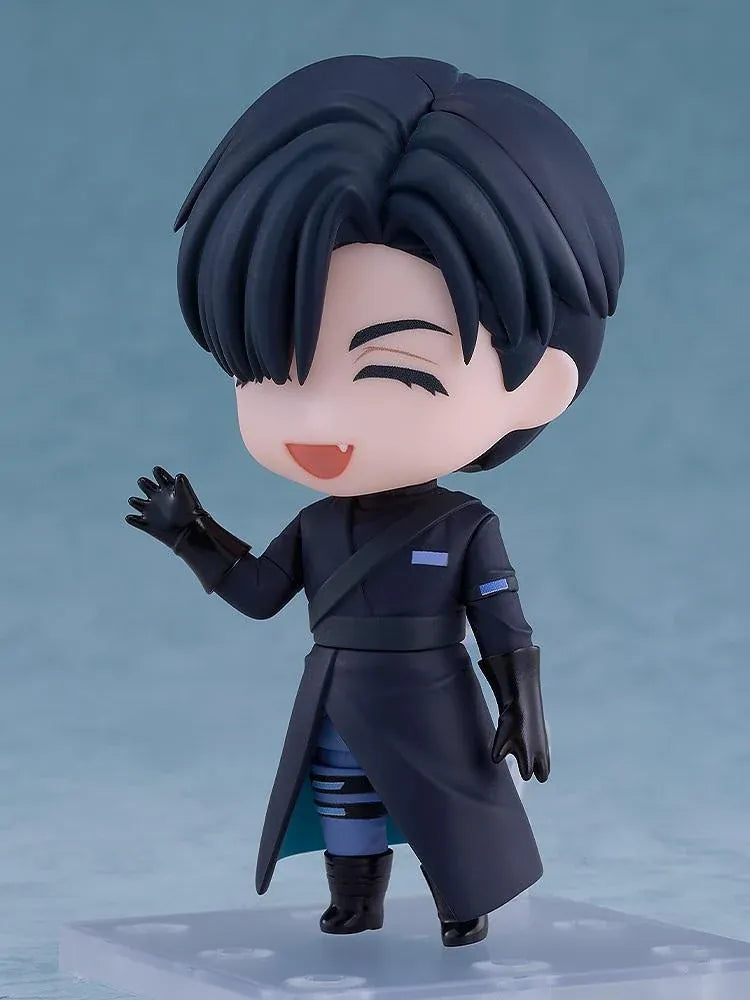 ALIEN STAGE Nendoroid Ivan Figure featuring a black-haired anime character with dark eyes, a small fang, a dark long-sleeved outfit, black gloves, and matching boots while holding a light-blue accessory.