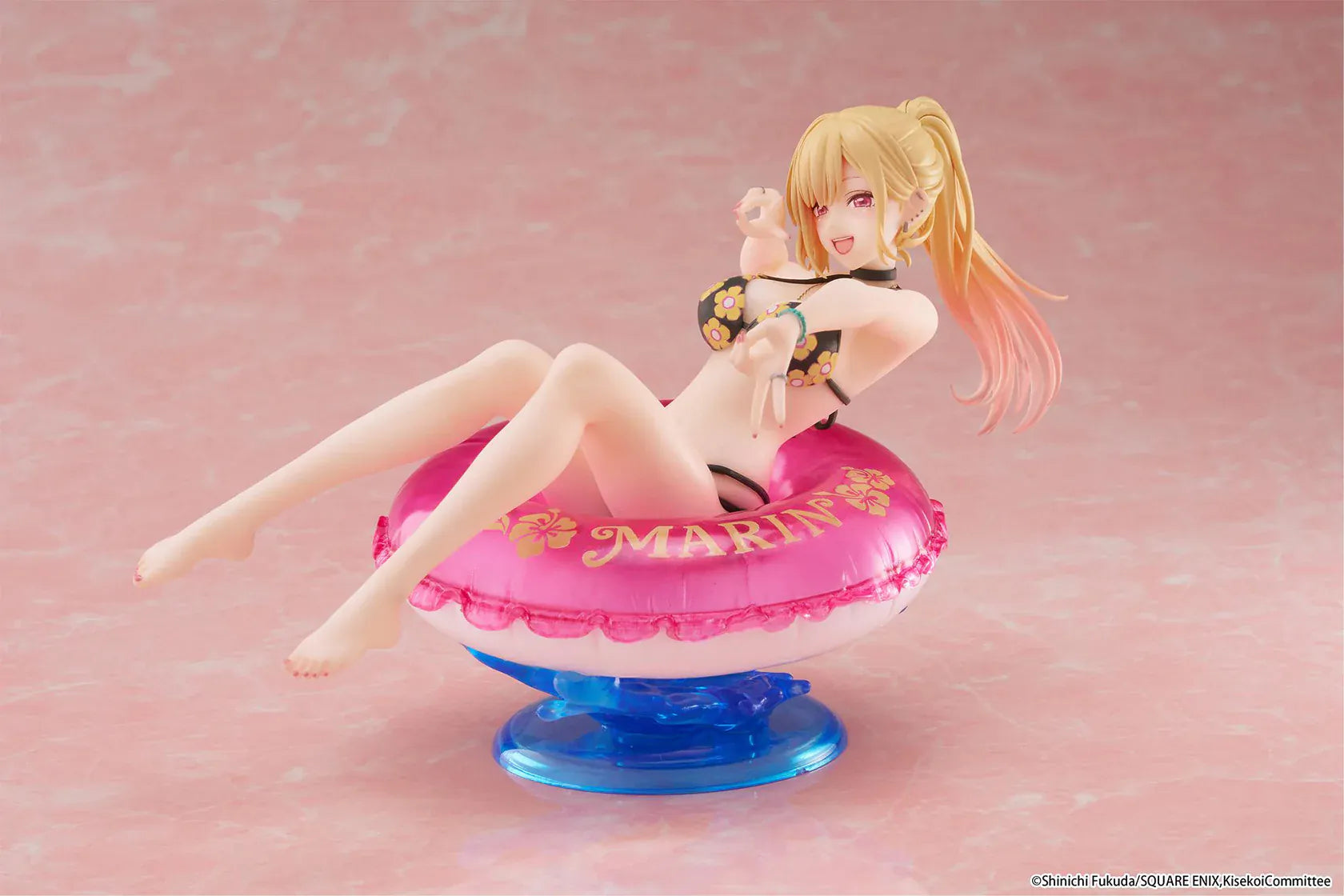 My Dress-Up Darling Aqua Float Girls Marin Kitagawa Figure Rerelease featuring Marin relaxing on a pink swim float with floral swimsuit and translucent water-style base.