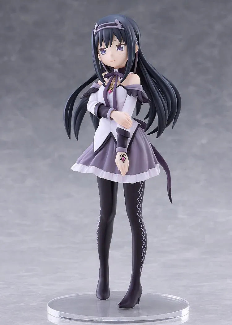 Homura Akemi figure with long black hair, violet eyes, a white and purple outfit, and diamond-patterned stockings, smiling with one hand resting on her arm.