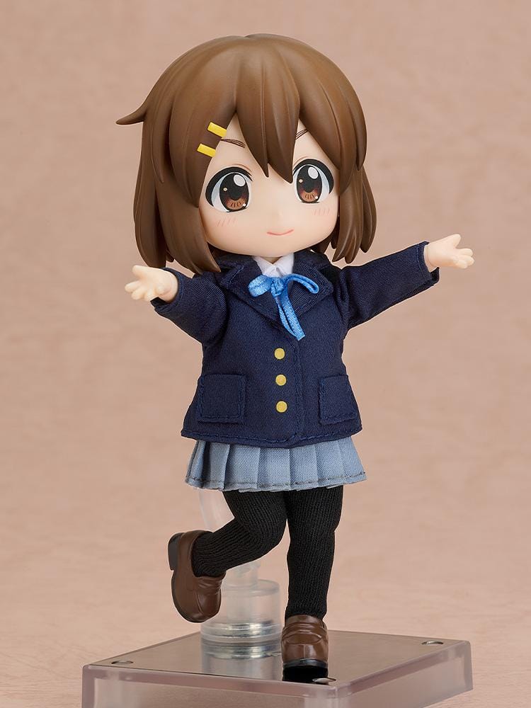K-ON Nendoroid Doll Yui Hirasawa wearing her Sakuragaoka High School uniform with navy blazer, pleated skirt, and blue ribbon