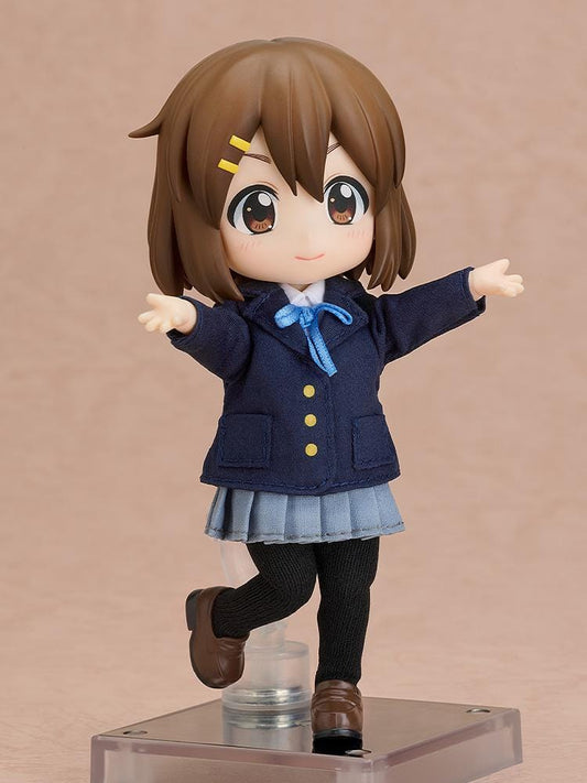 K-ON Nendoroid Doll Yui Hirasawa wearing her Sakuragaoka High School uniform with navy blazer, pleated skirt, and blue ribbon