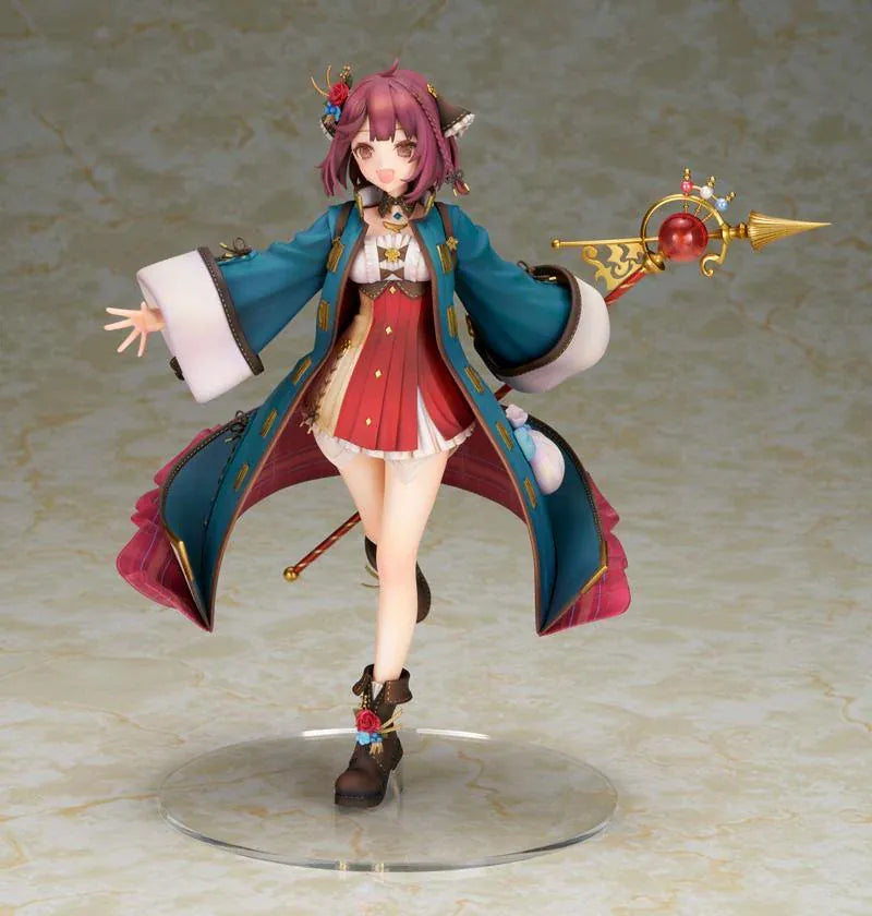 Sophie Neuenmuller figure smiling in a dynamic pose, wearing a teal coat over a red outfit and holding an ornate gold staff with a red orb.