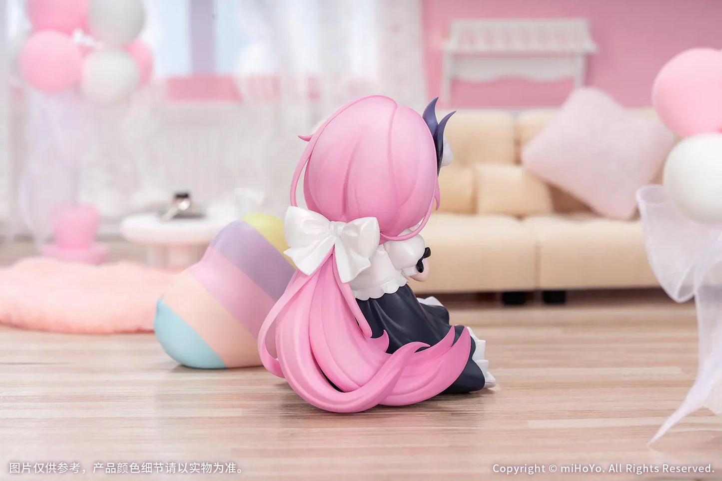 Honkai Impact 3rd Little Series Elysia Little Flame-Chaser Ver. Figure featuring Elysia with pink hair, chibi styling, black-and-white outfit, purple bow accents, and pastel heart cushion.