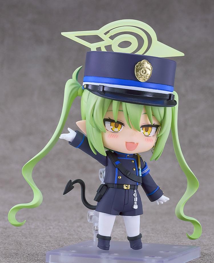 Blue Archive Nendoroid Nozomi Tachibana Figure featuring Nozomi with light green twin tails, golden eyes, oversized officer cap, academy uniform, and halo-style effect piece.