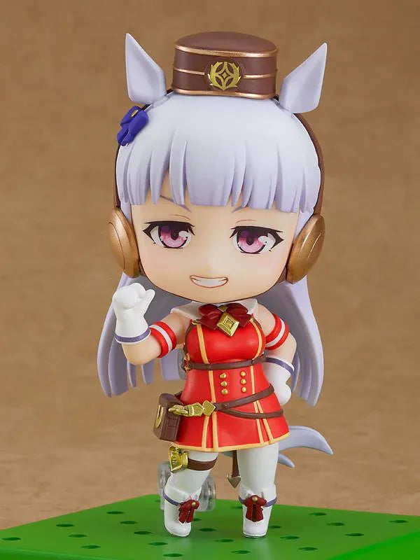 Umamusume Pretty Derby Nendoroid Gold Ship figure wearing her signature red and white outfit with horse ears, tail, and headgear
