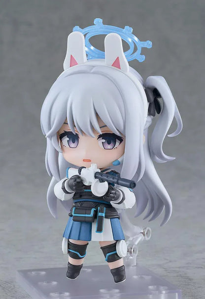 Blue Archive Nendoroid Miyako Tsukiyuki with silver hair, rabbit-ear headband, blue halo, white jacket, blue skirt, and black tactical gear.