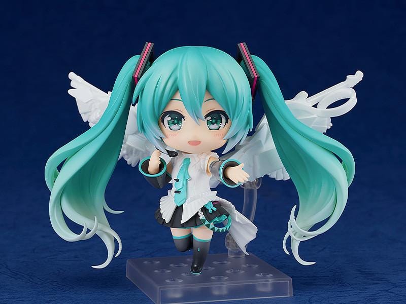 Hatsune Miku Happy 16th Birthday Ver. Nendoroid figure with turquoise twin-tails, white outfit, microphone, and translucent wings