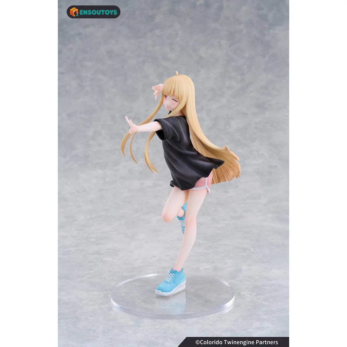 Kaguya In the Real World Ver. 1/7 scale figure with flowing blonde hair, a black outfit, blue sneakers, and a winking peace-sign pose.