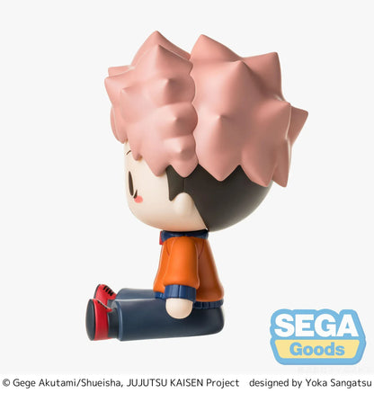 Yuji Itadori chibi figure in a seated pose with pink hair, facial markings, and an orange and navy outfit.