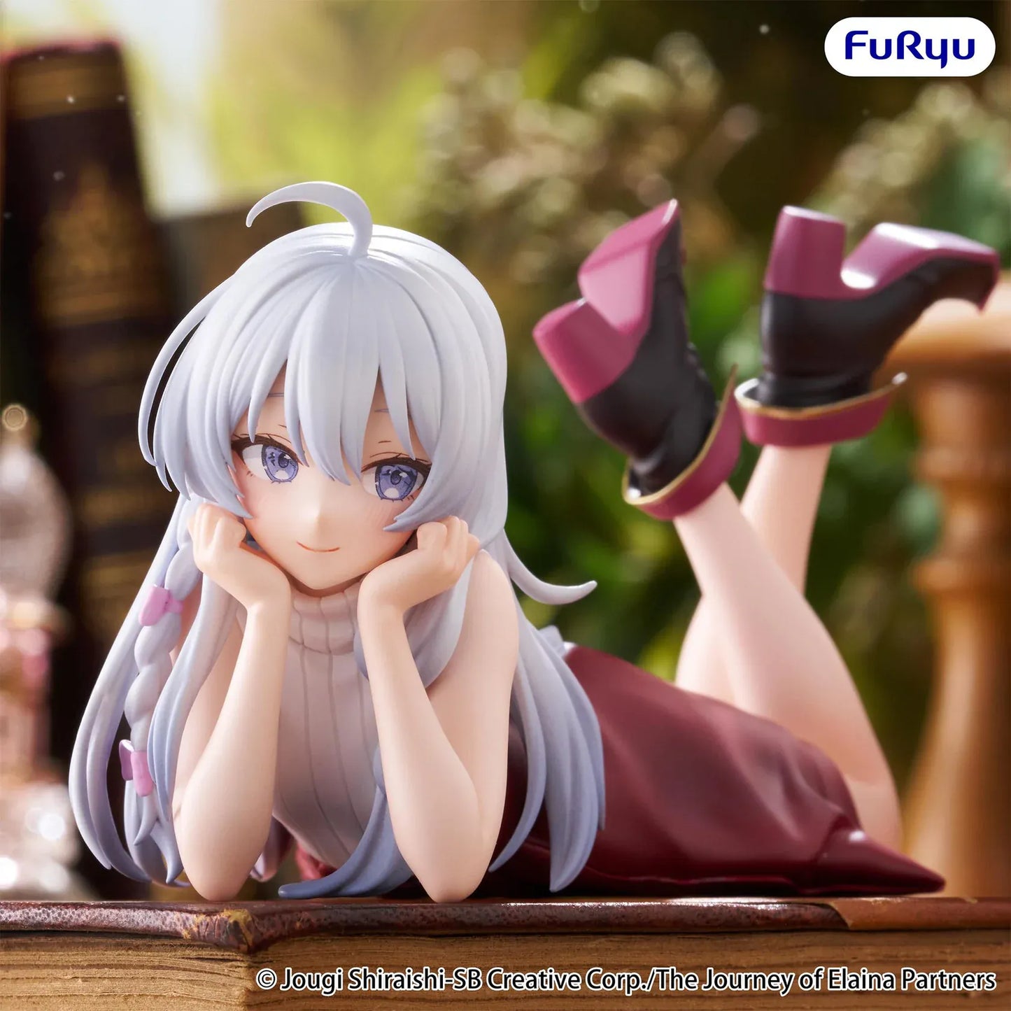 The Journey of Elaina Noodle Stopper Elaina Lying Down Ver. figure featuring silver hair, a relaxed lying pose, and an elegant outfit