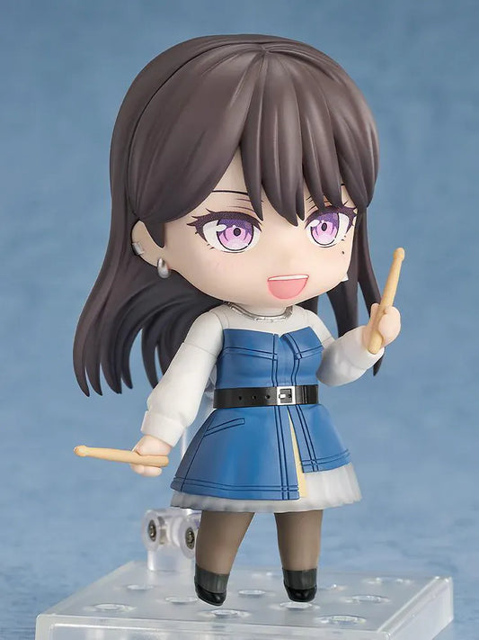 BanG Dream Nendoroid Taki Shiina Figure featuring Taki in a chibi-style design with long dark hair, purple eyes, blue outfit, and drumstick accessory.