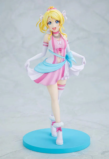 Love Live School Idol Project Eli Ayase Bokutachi wa Hitotsu no Hikari Ver. Figure with blonde hair, pink-and-white idol outfit, blue sash, and display base